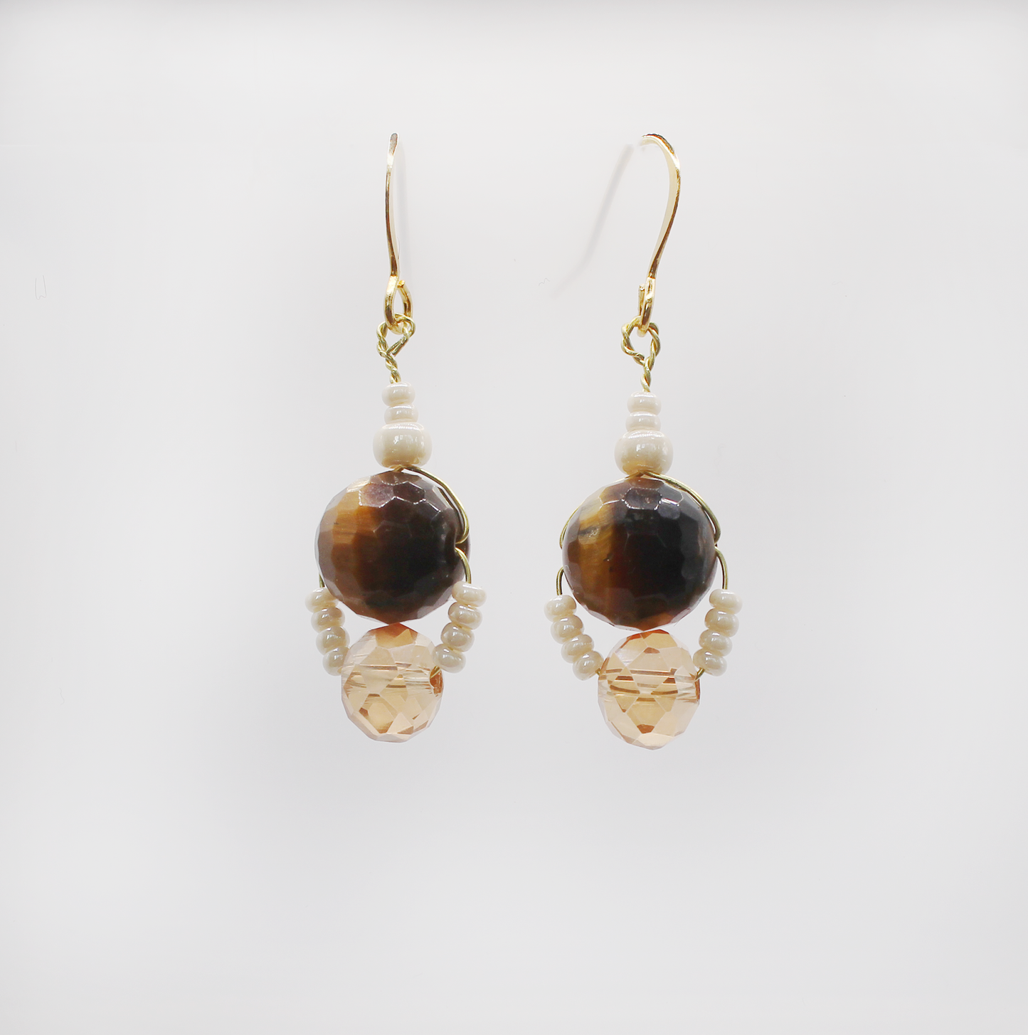 Handmade tigers eye earrings, mother of pearl and vintage crystal beads.