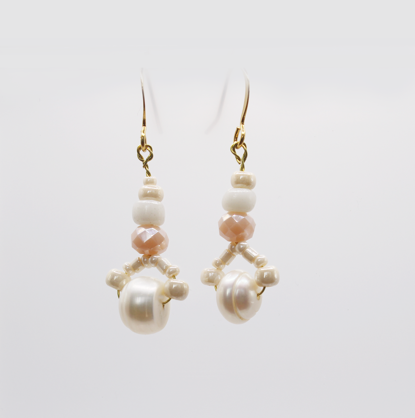 Handmade fresh water pearl earrings with vintage beads.