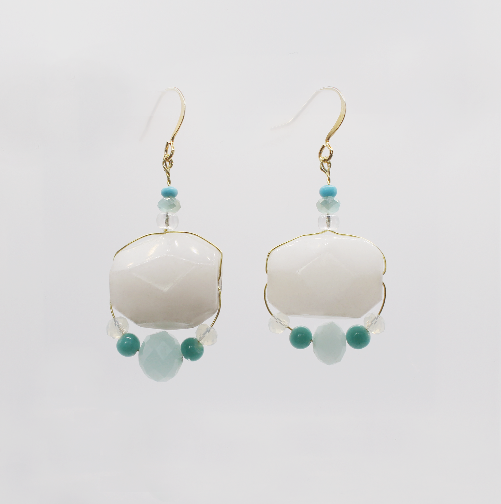 loved and found milky gemstone earrings by loved and found. Precious stone earrings. White earrings. 