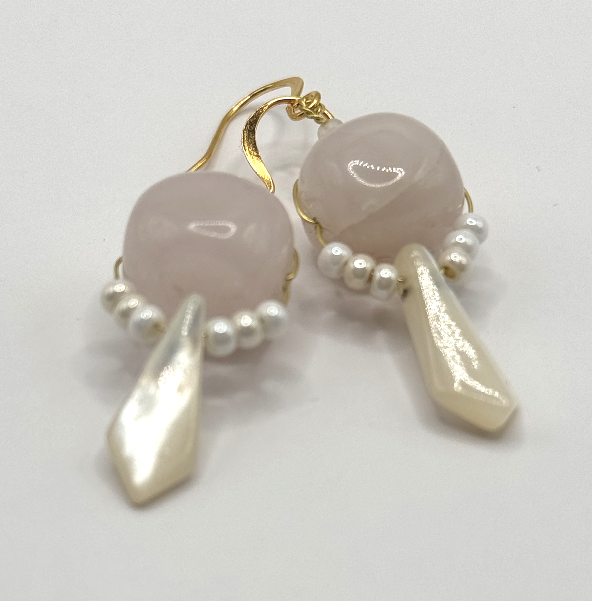 Handmade Rose Quartz and mother of pearl earrings.