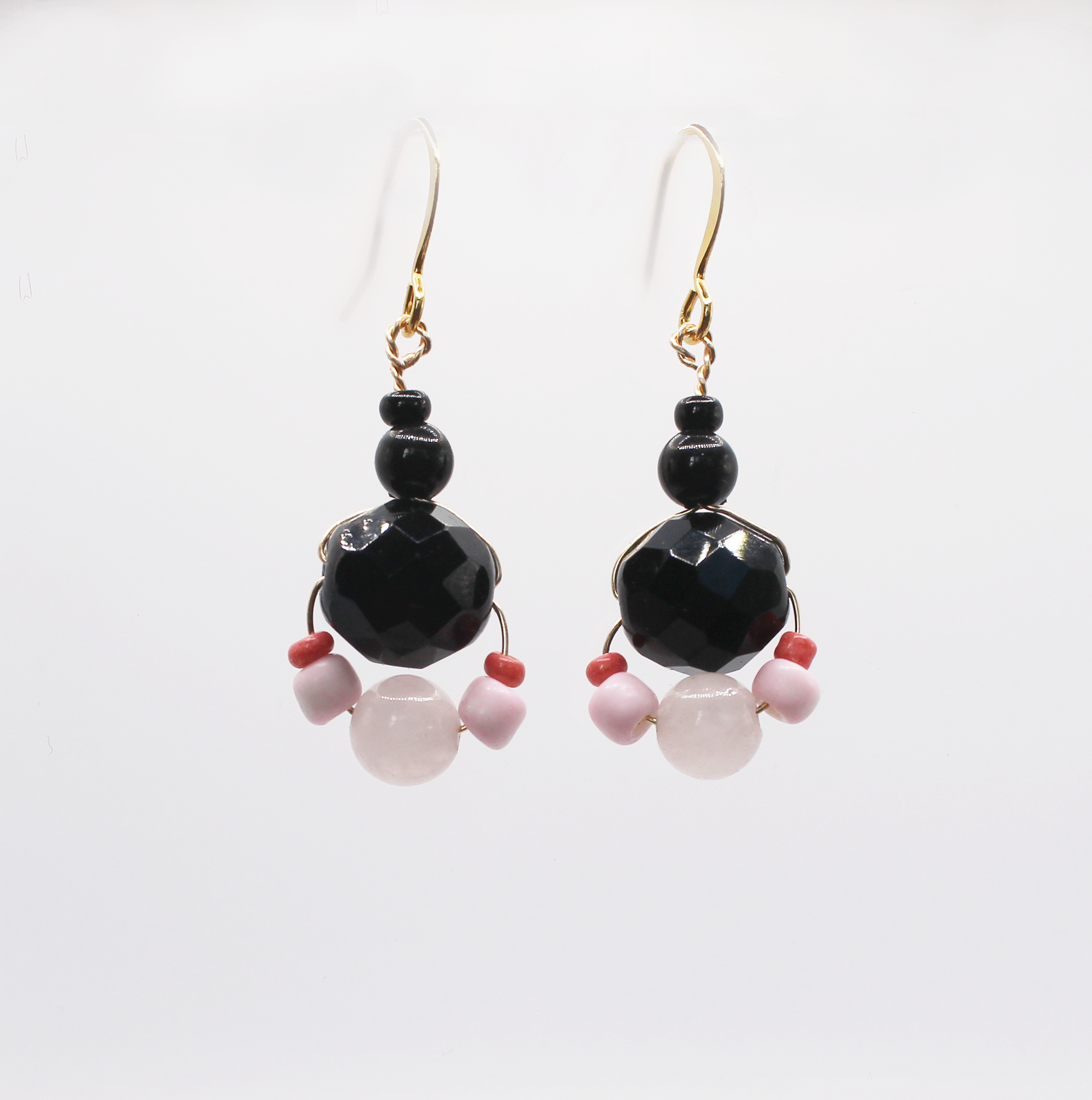 Handmade black faceted vintage glass earrings made with  Rose Quartz gemstones.