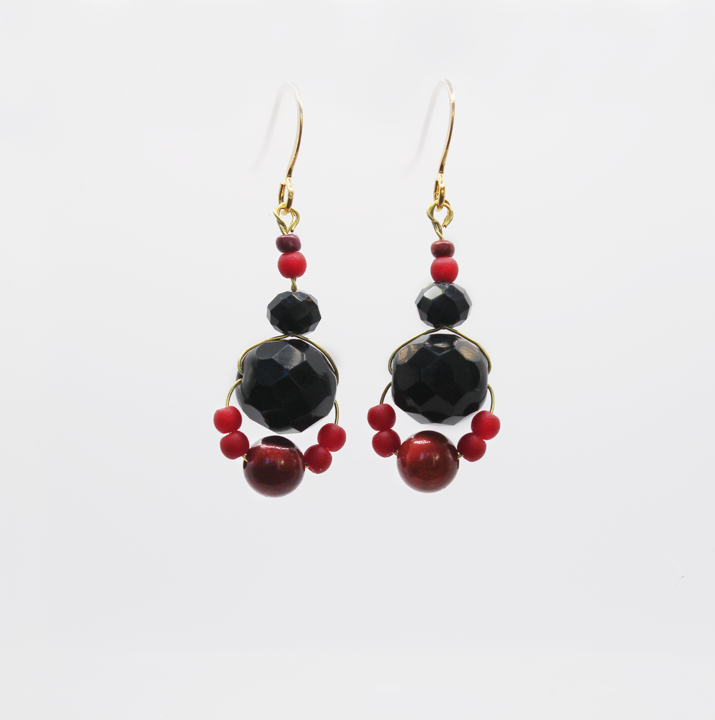 Handmade earrings with vintage faceted glass beads and small Mookaite stones.