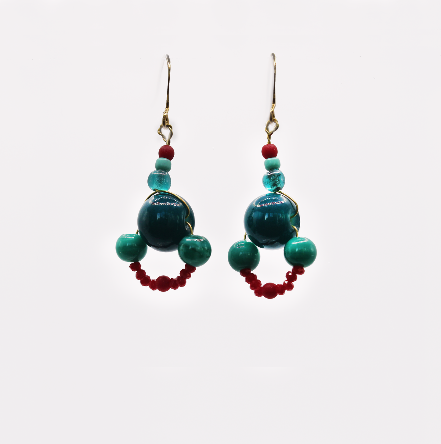 Handmade with vintage glass beaded earrings and stones in reds, blues and greens.